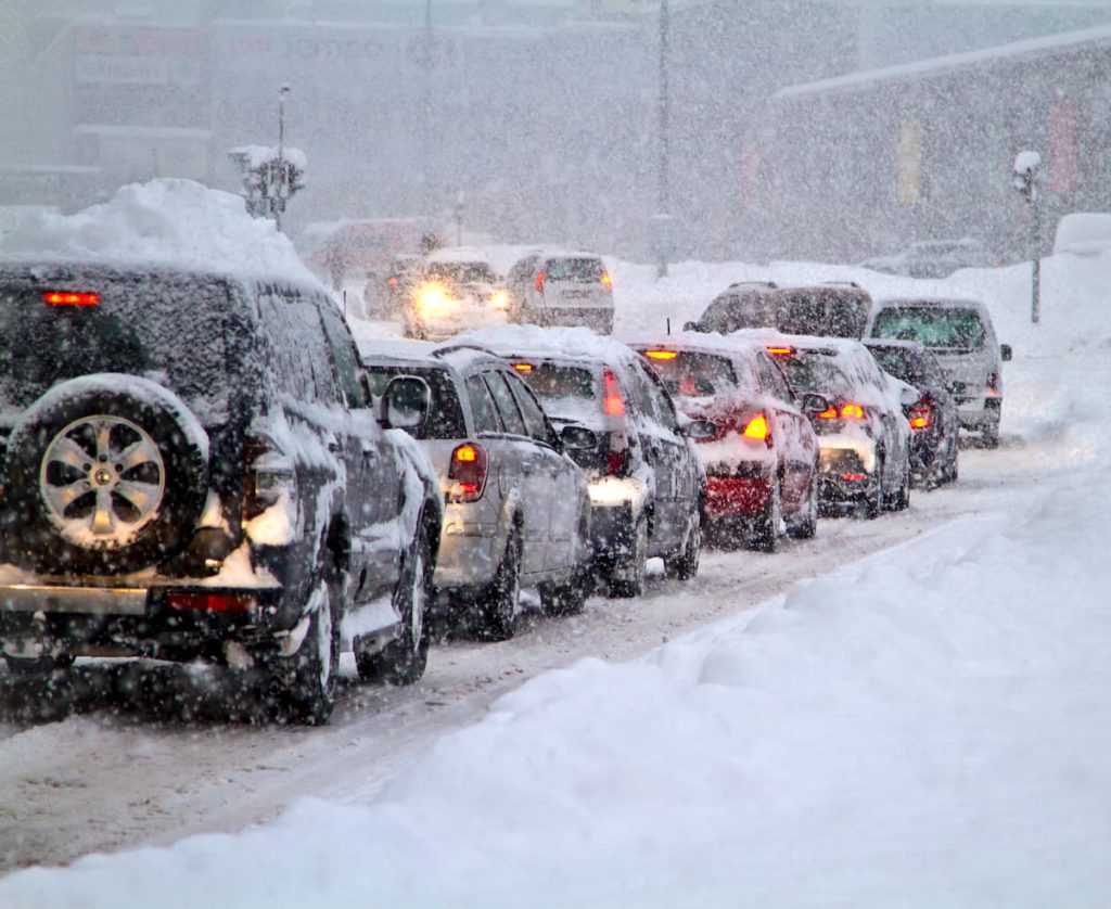 traffic, cars covered in snow